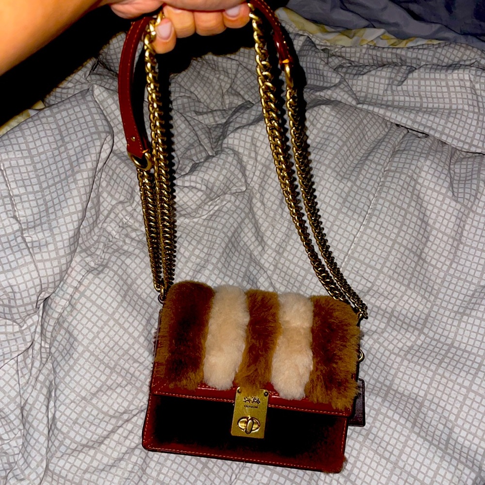 Coach shearling fur crossbody bag. Like new. Excellent condition.